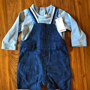 Brand new with tags boys overall one piece size 6 mo but measures large.